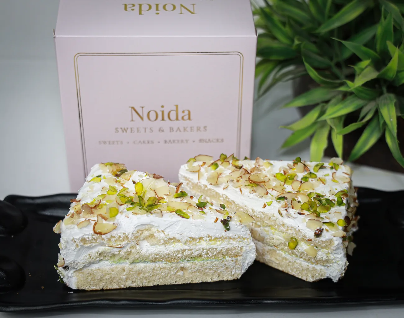 Badam pista pastry with our gift box — fresh from the Noida Sweets and Bakers oven Badam pista pastry with our gift box — fresh from the Noida Sweets and Bakers oven