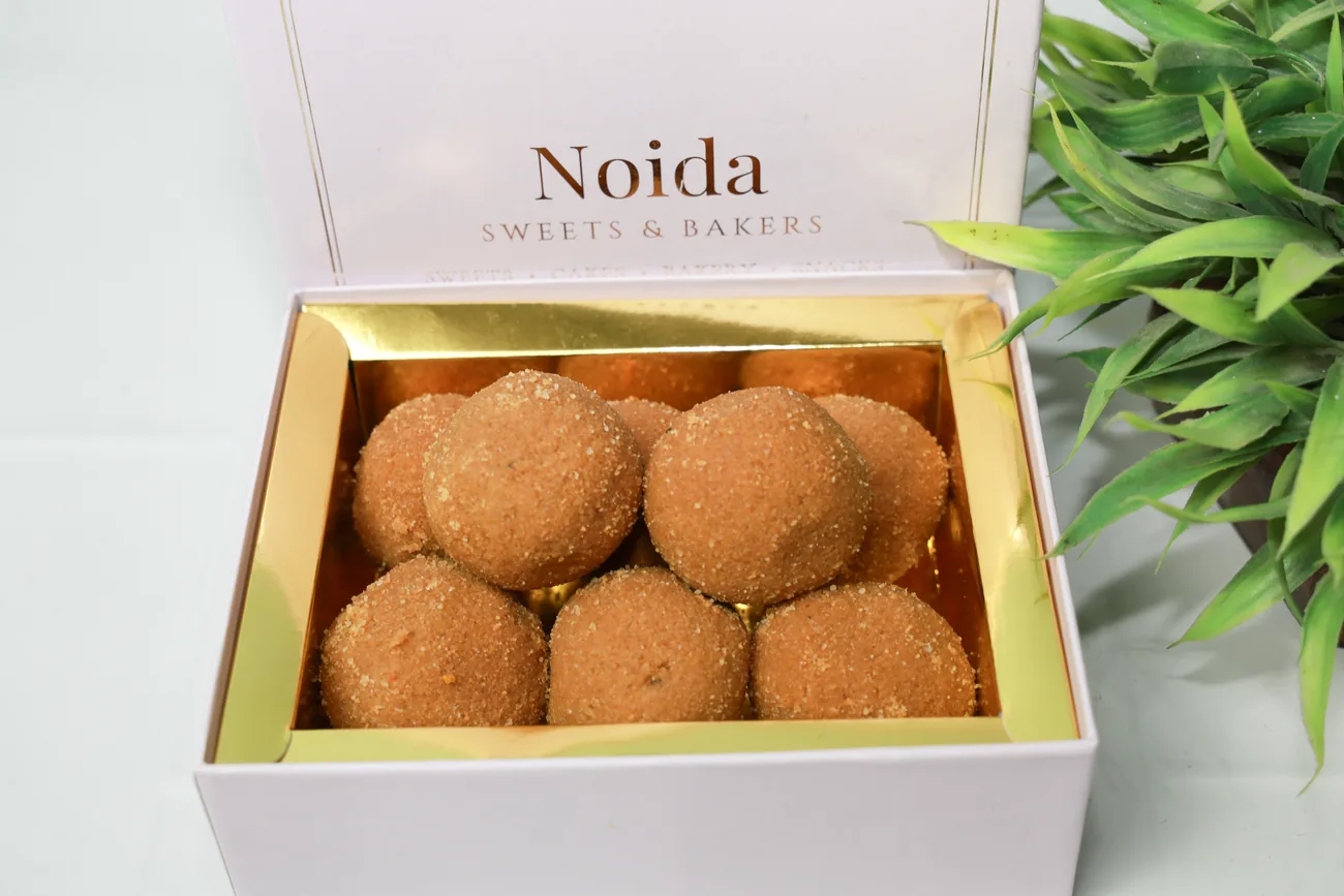 Besan laddus in our gift box — our photo Besan laddus in our gift box — our photo