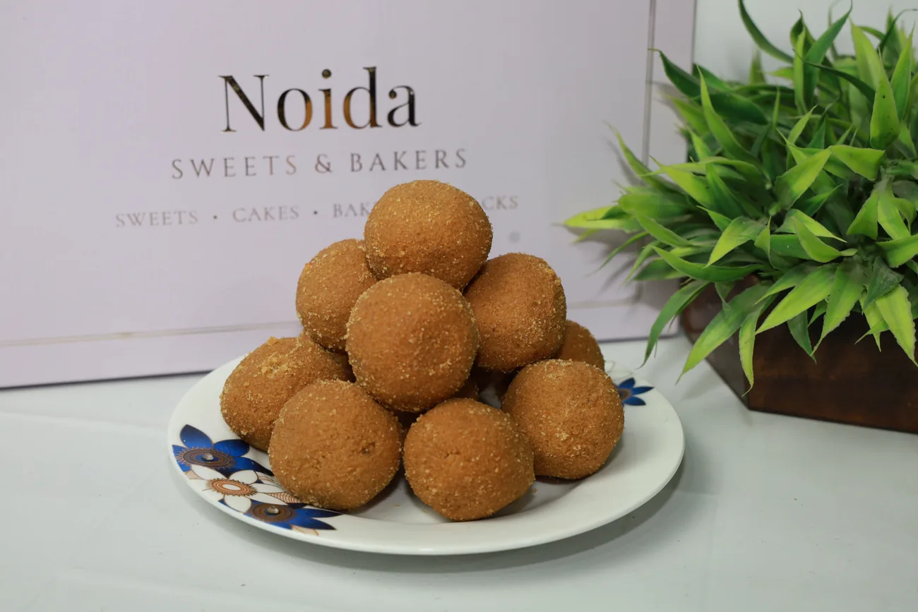 Besan laddus with the branded box — our photo Besan laddus with the branded box — our photo