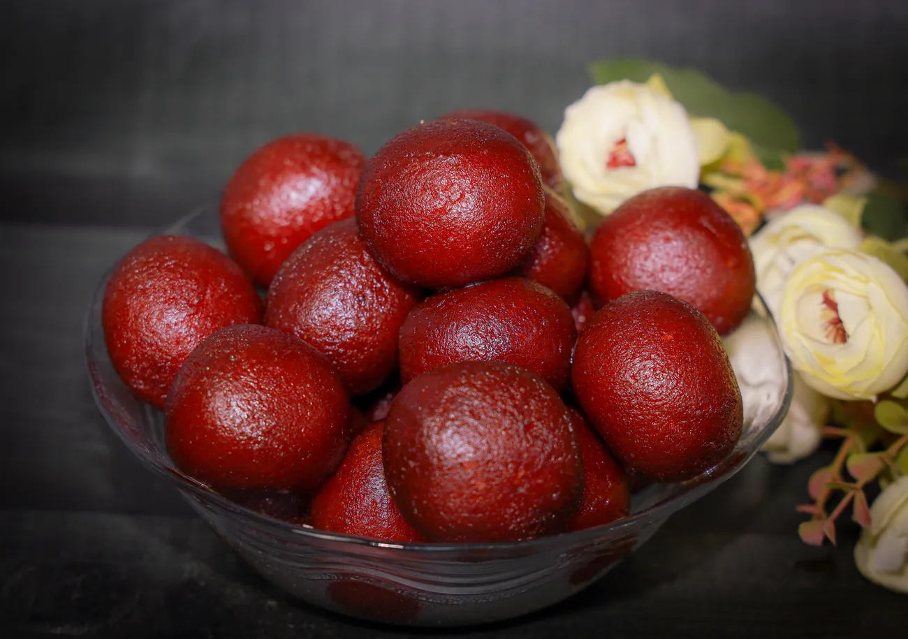 Gulab jamun in a glass bowl — our photo Gulab jamun in a glass bowl — our photo