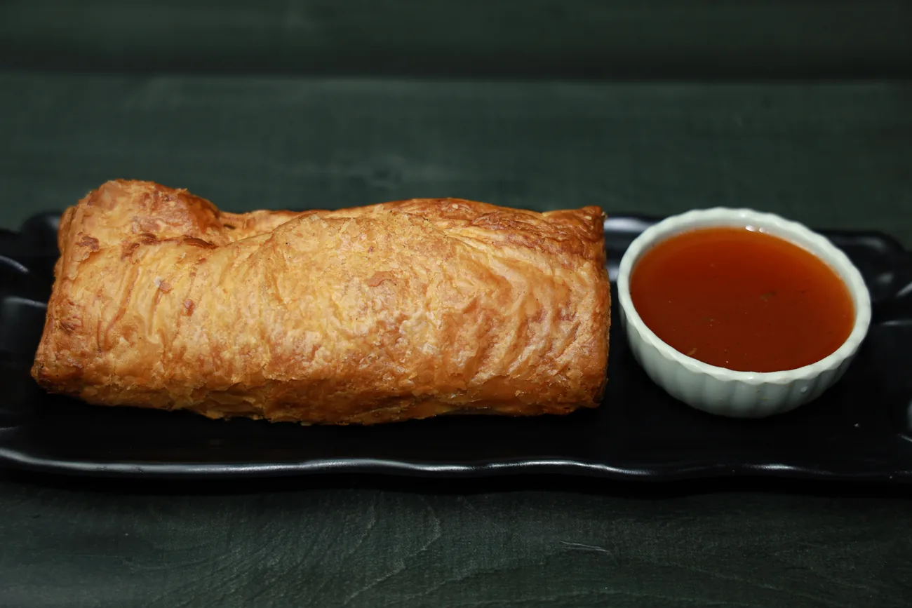 Fresh-baked patty — our photo Fresh-baked flaky patty with dip — our photo